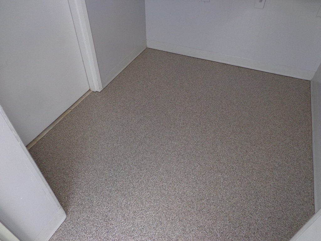 Textured coated deck floor